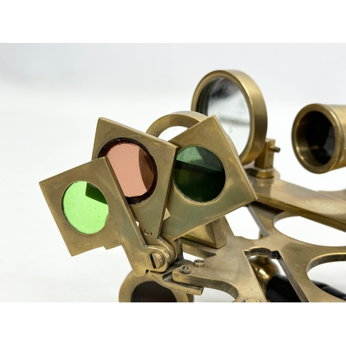 66 - Ross Evans, London. An Early 20th Century brass sextant with case. By Ross Evans.