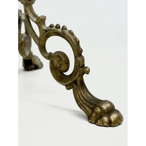 420 - A vintage brass plant stand. With mythical creatures and paw feet. 35x35x57cm