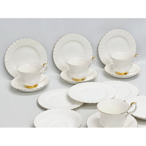 441 - A 16 piece Royal Albert “Val D’or” tea service. Including a model plane and pewter dish.