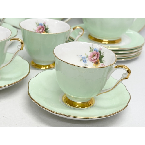 443 - A vintage 20 piece Queen Anne tea service.