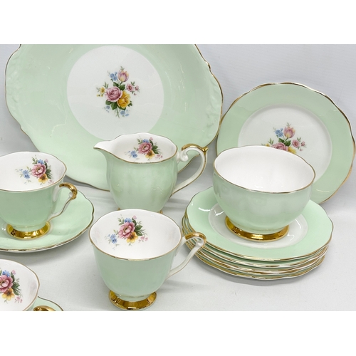 443 - A vintage 20 piece Queen Anne tea service.