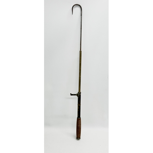 105 - An Early 20th Century Hardy’s telescopic brass fishing gaff. 87cm. 63cm. 37cm.