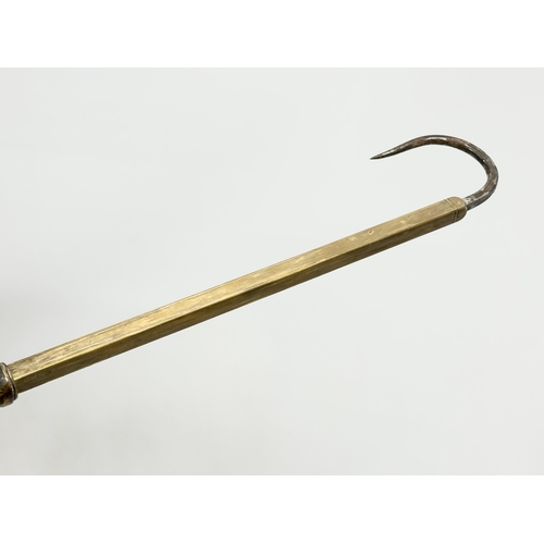 105 - An Early 20th Century Hardy’s telescopic brass fishing gaff. 87cm. 63cm. 37cm.