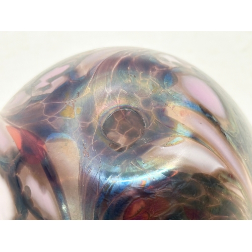 47 - A vintage iridescent art glass bulbous vase. 9.5x9.5cm.