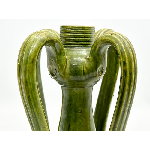 87 - An Early 20th Century Belgian Art Nouveau glazed stoneware vase. Circa 1900-1930. 14x14x24cm.