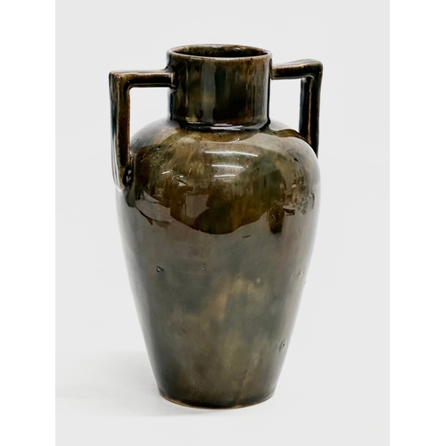 89 - Christopher Dresser. A Late 19th Century glazed stoneware vase. Attributed to Christopher Dresser. 1... 