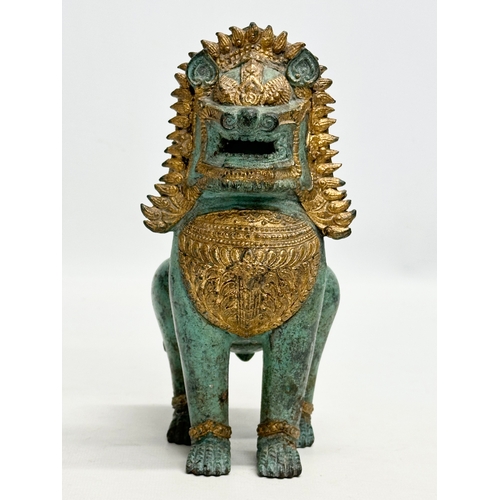 2 - A Late 19th/Early 20th Century Thai gilt bronze Singha Temple Lion. 11x10x20cm.