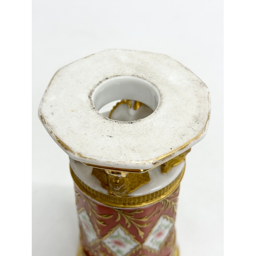 108 - Paris Porcelain. A 19th Century hand painted vase with embossed gilding, raised on 3 winged lion paw... 