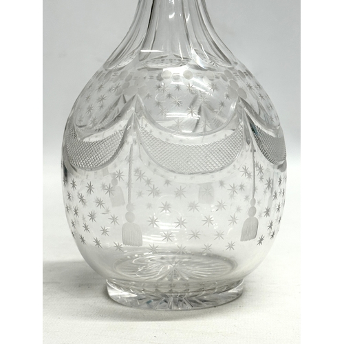 92 - A 19th Century Victorian glass decanter with etched star and draped curtain pattern bowl. 28cm