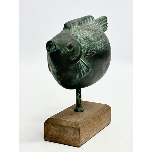 65 - A 20th Century bronze fish sculpture on wooden base. 17x15cm.