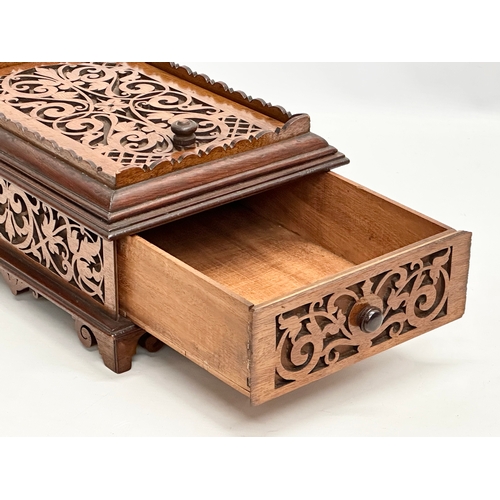 41 - A Late 19th Century carved fretwork dressing box. 27x20x14cm.