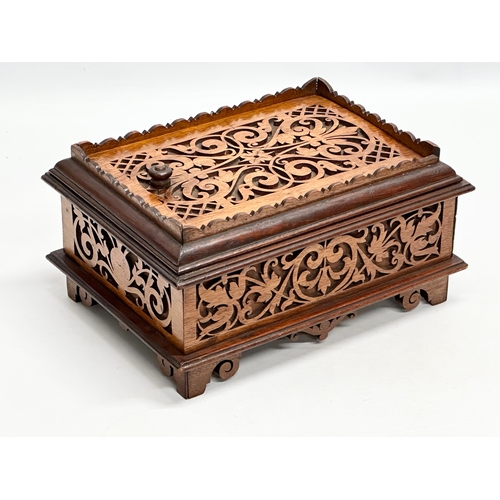 41 - A Late 19th Century carved fretwork dressing box. 27x20x14cm.