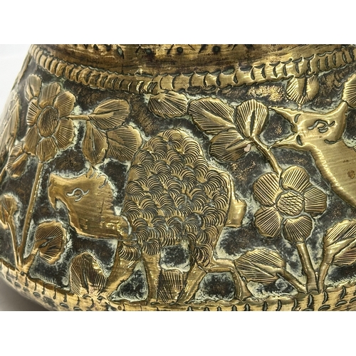 111 - A Mid 19th Century Indian/Burmese embossed brass jardiniere/planter. With deers, elephants, leopards... 