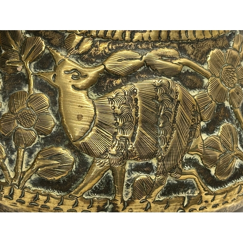 111 - A Mid 19th Century Indian/Burmese embossed brass jardiniere/planter. With deers, elephants, leopards... 