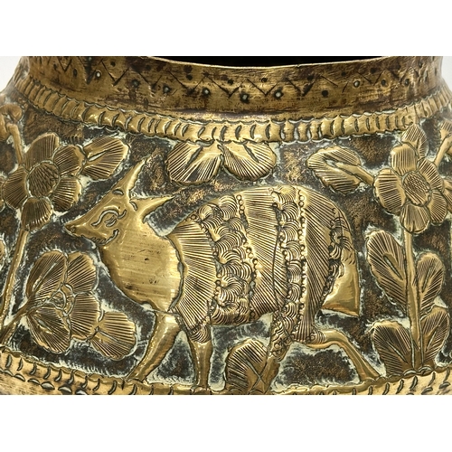 111 - A Mid 19th Century Indian/Burmese embossed brass jardiniere/planter. With deers, elephants, leopards... 