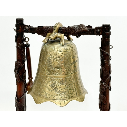 12 - A large Late 19th Century Chinese bronzed spelter framed gong. 27x14x40cm.