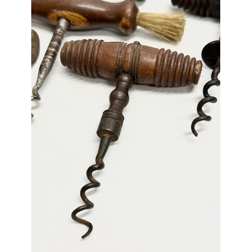 139 - A good collection of 19th Century corkscrews.