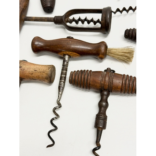 139 - A good collection of 19th Century corkscrews.