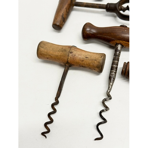 139 - A good collection of 19th Century corkscrews.