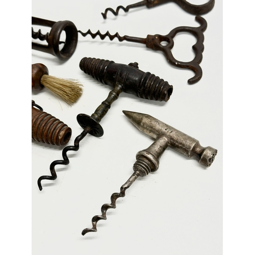 139 - A good collection of 19th Century corkscrews.