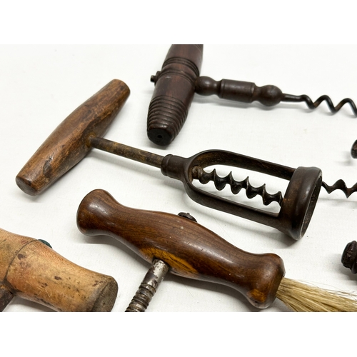 139 - A good collection of 19th Century corkscrews.