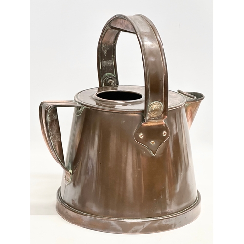 140 - Orme Evans & Co. An Early 20th Century copper hot water jug. Circa 1915. 32x29x24cm.