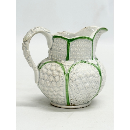 143 - 3 small 19th Century jugs. An Earlu 19th Century Ridgway drap stoneware jug, with Doric spout, 1800-... 