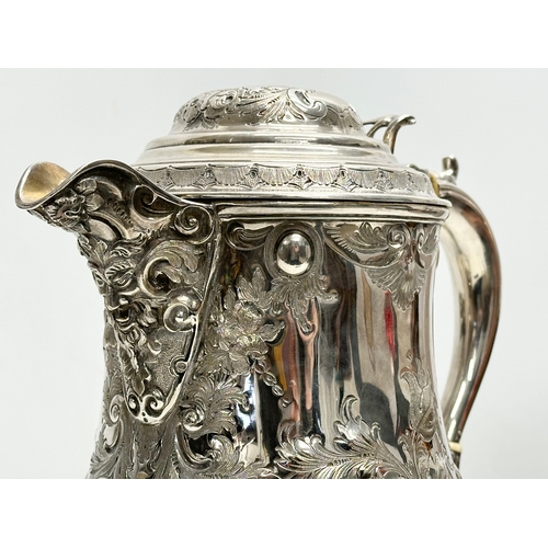 144 - A large 19th Century Martin Hall & Co silver plated tankard jug. 21x28cm.