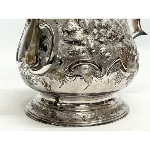 144 - A large 19th Century Martin Hall & Co silver plated tankard jug. 21x28cm.