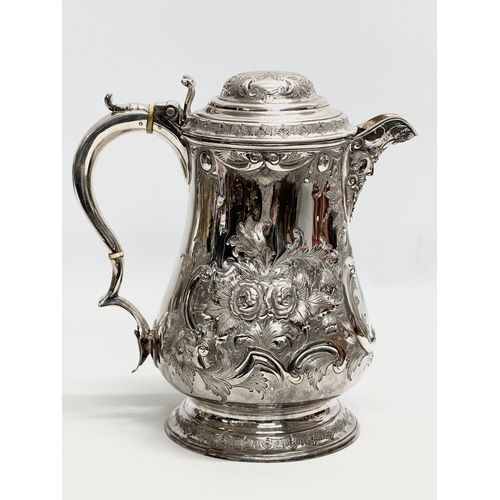 144 - A large 19th Century Martin Hall & Co silver plated tankard jug. 21x28cm.