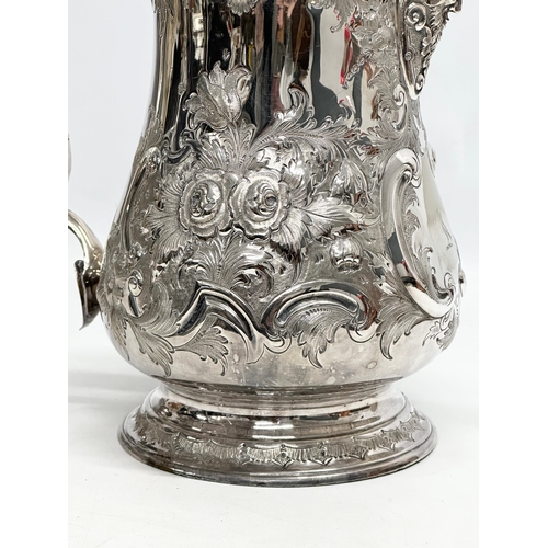 144 - A large 19th Century Martin Hall & Co silver plated tankard jug. 21x28cm.