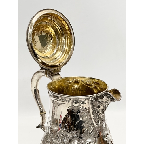 144 - A large 19th Century Martin Hall & Co silver plated tankard jug. 21x28cm.