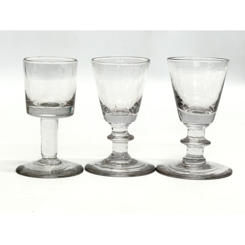 154 - A collection of 18th and 19th Century Georgian and Victorian glassware. A pair of George III sherry ... 