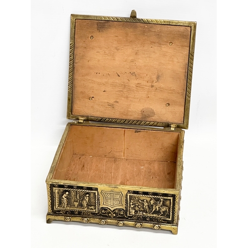 54 - A Late 19th/Early 20th Century brass moulded cigar box, with medieval scenes. 17x17x8cm.