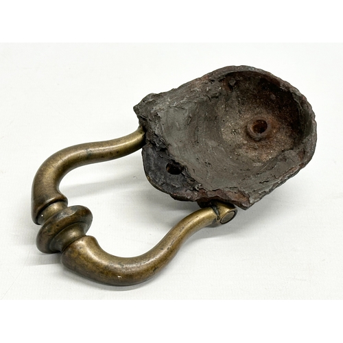 158 - A Victorian Egyptian revival door knocker. 16cm.