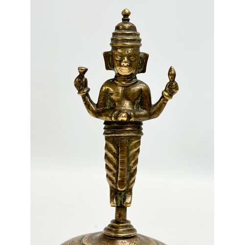 159 - A Late 19th Century Burmese style brass bell. 10x18cm.