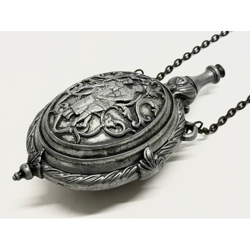 164 - A 20th Century German powder flask style moulded hanging. 35cm including chain.