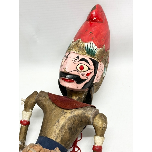 17 - 2 Early 20th Century Wayang Golek puppet dolls. 57cm