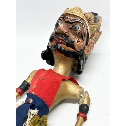 17 - 2 Early 20th Century Wayang Golek puppet dolls. 57cm