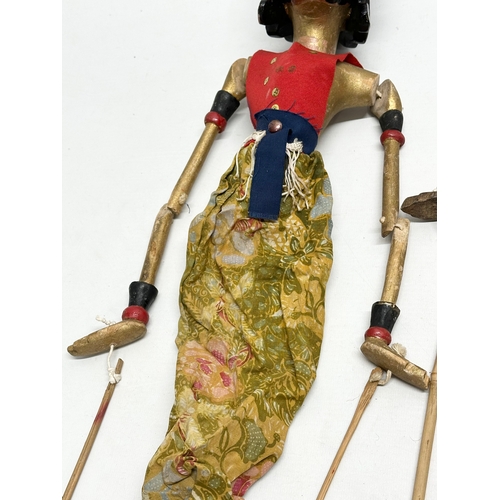 17 - 2 Early 20th Century Wayang Golek puppet dolls. 57cm