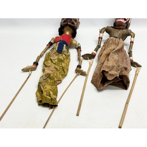 17 - 2 Early 20th Century Wayang Golek puppet dolls. 57cm