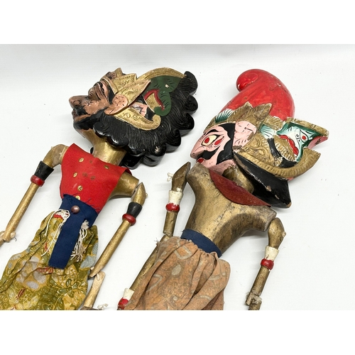 17 - 2 Early 20th Century Wayang Golek puppet dolls. 57cm