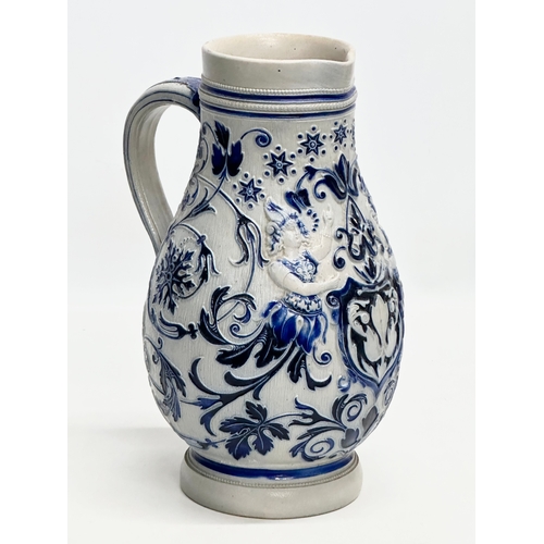 173 - A Late 19th Century German salt glazed pitcher. Westerwald. 18x27cm.