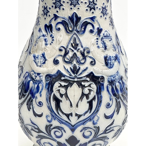 173 - A Late 19th Century German salt glazed pitcher. Westerwald. 18x27cm.