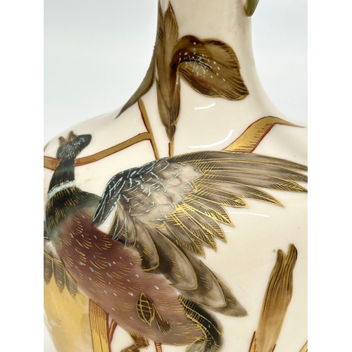 174 - A Late 19th Century hand painted pottery ewer. With bird in flight, gilt clouds and full moon on a b... 