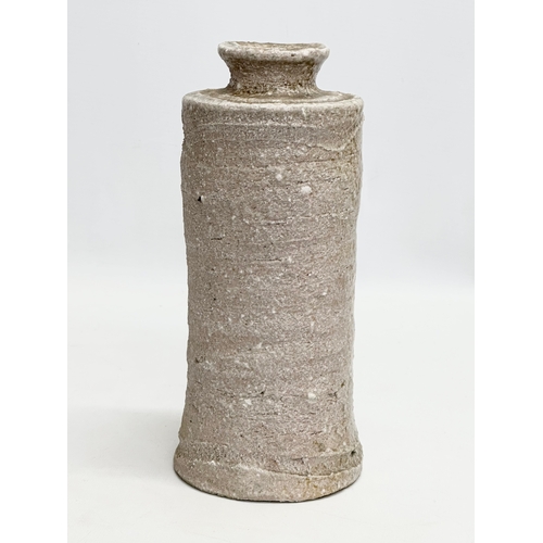 178 - A signed Mid 20th Century Japanese Shigaraki bottle style vase. 11x24cm.