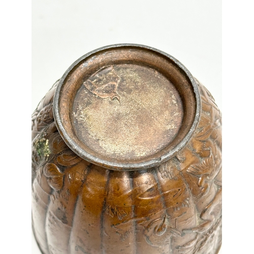 179 - A small Late 19th Century Japanese bronze pot with cover. With glass top handle, embossed wildflower... 