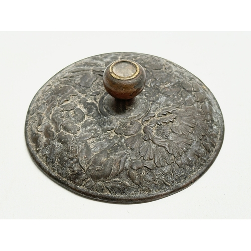 179 - A small Late 19th Century Japanese bronze pot with cover. With glass top handle, embossed wildflower... 