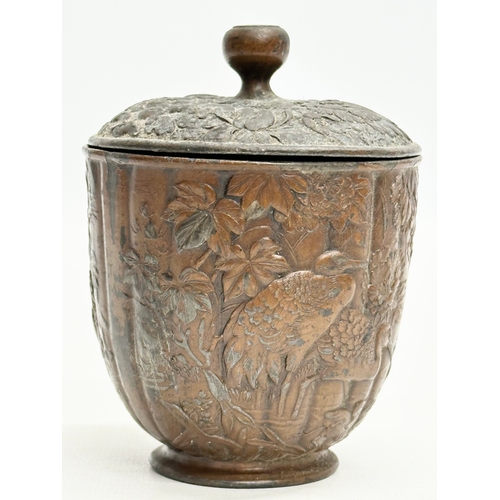 179 - A small Late 19th Century Japanese bronze pot with cover. With glass top handle, embossed wildflower... 