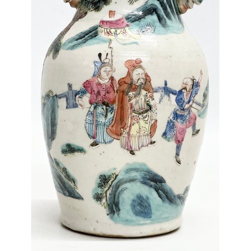 201 - A 19th Century Chinese Late Qing Dynasty vase. Decorated by 2 foo dog handles, god and immortals on ... 